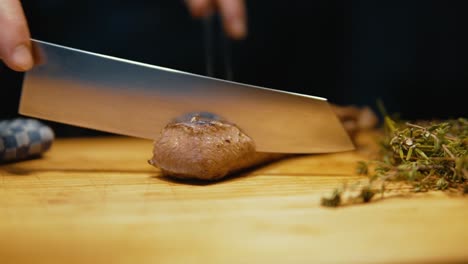 sizzling delights: chef cutting  mouthwatering meat deer dish