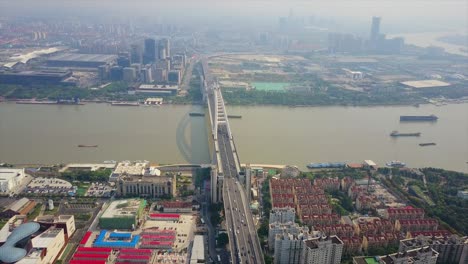 china day time shanghai cityscape traffic lupu bridge riverside aerial panorama 4k