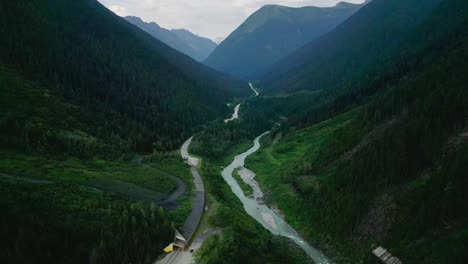 Gap-approach-between-mountainw-with-a-highway-and-river