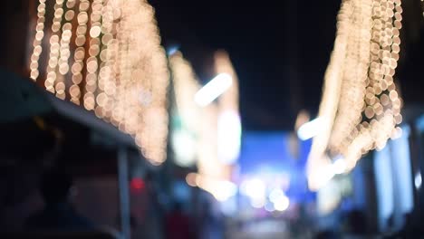 blurred light decorations on streets in india for christmas and diwali, slow motion