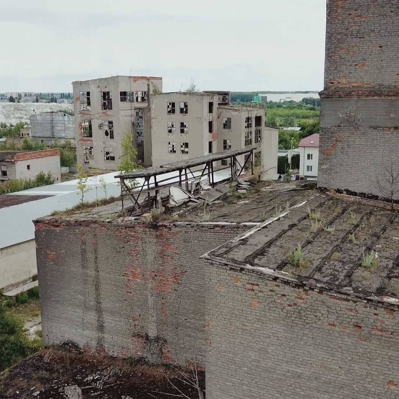 Abandoned ruined industrial factory building, ruins and demolition concept. Aerial view