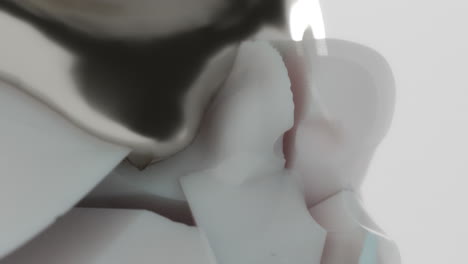 a silver liquid metal flows slowly on the sculpture