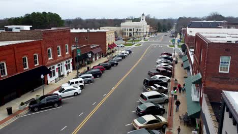 Small-Town-Mocksville-North-Carolina-forward-Aerial-during-Christmas-time