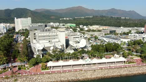 cluster of satellite broadcast dishes on hong kong, aerial view