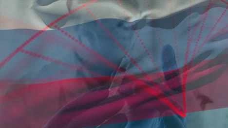 Animation-of-flag-of-russia-waving-over-doctor-wearing-face-mask-and-holding-vaccine