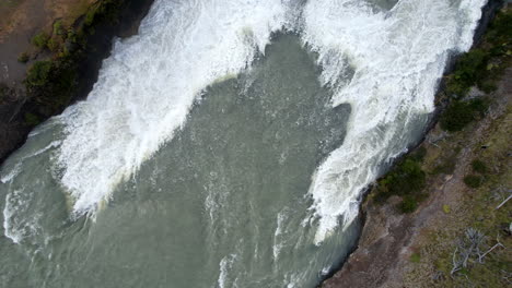 Aerial-View-Of-Flowing-River-Water-In-Alaska