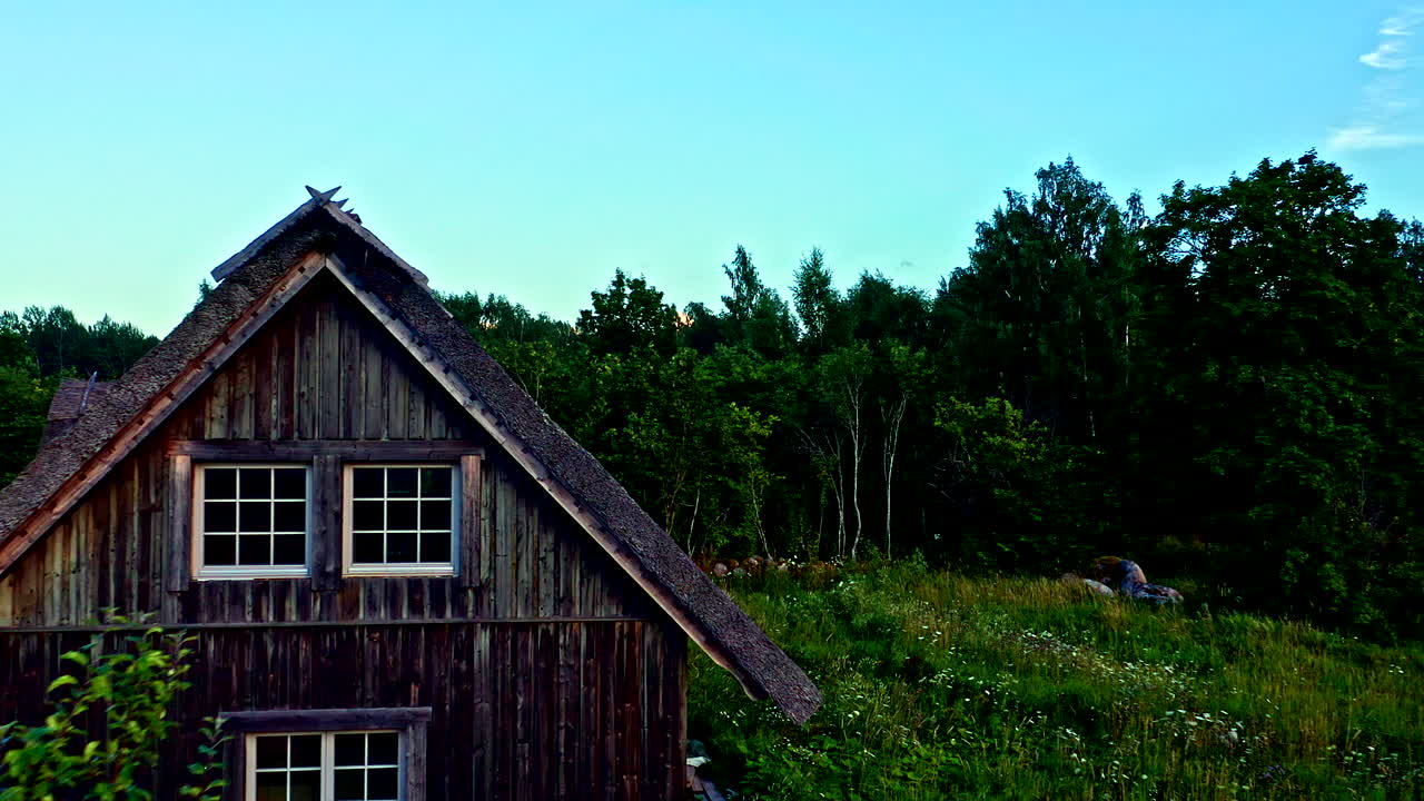 Small House in the Estonian Forests, Drone Flying By - Dolly Shot