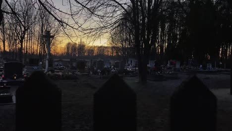 Graveyard-Christian-in-evening-with-cross,-Mosonmagyarovar,-Hungary