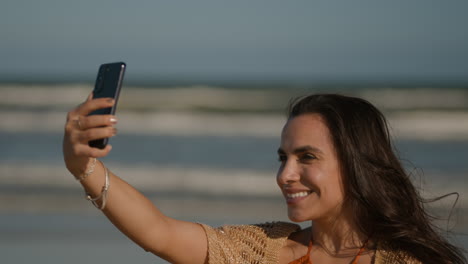 girl smiling at the beach