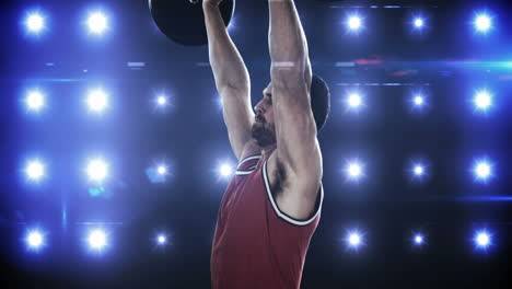 young man lifting up barbell