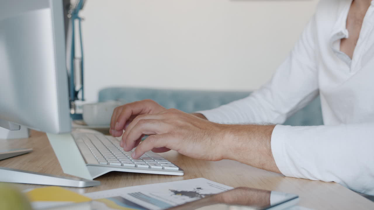 Person Working at a Computer Desk
