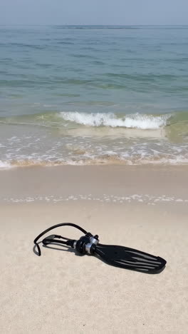 scuba diving gear on the beach
