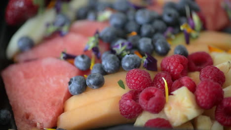 close up to a banquet of fresh fruits, with radiant colors