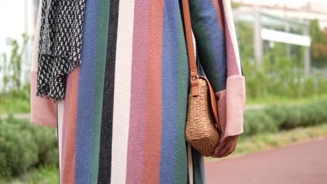 woman in a striped dress and scarf