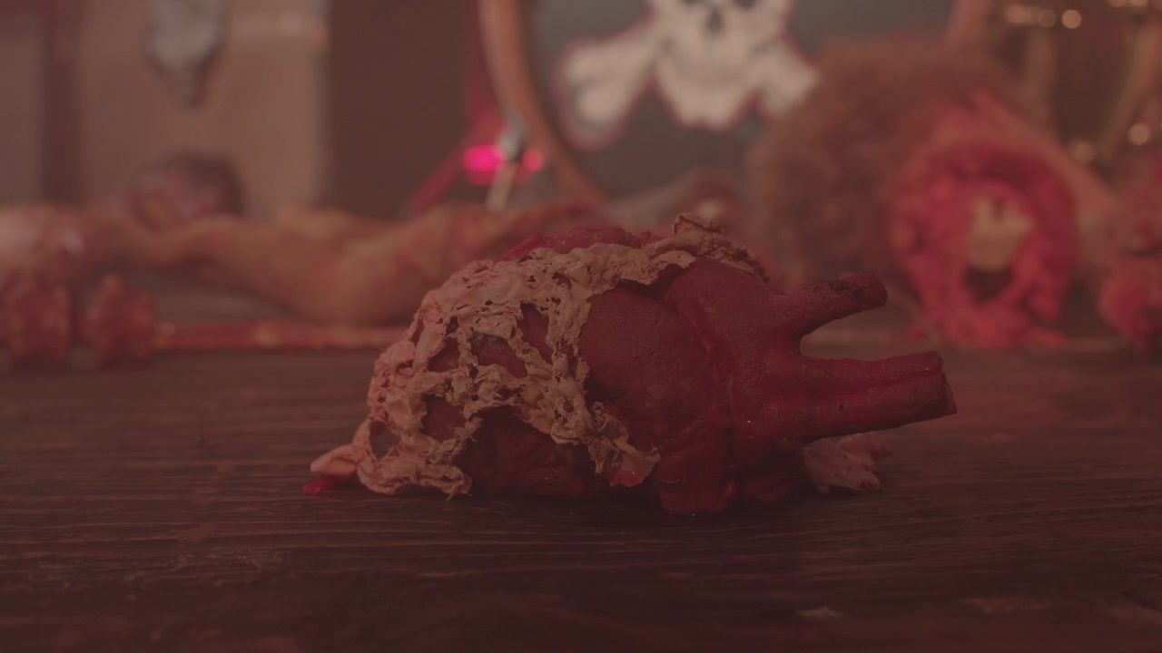 Anatomical heart. Halloween stage, a rock band stage decorated with blood and guts gore set details, massacre and horror video concept.