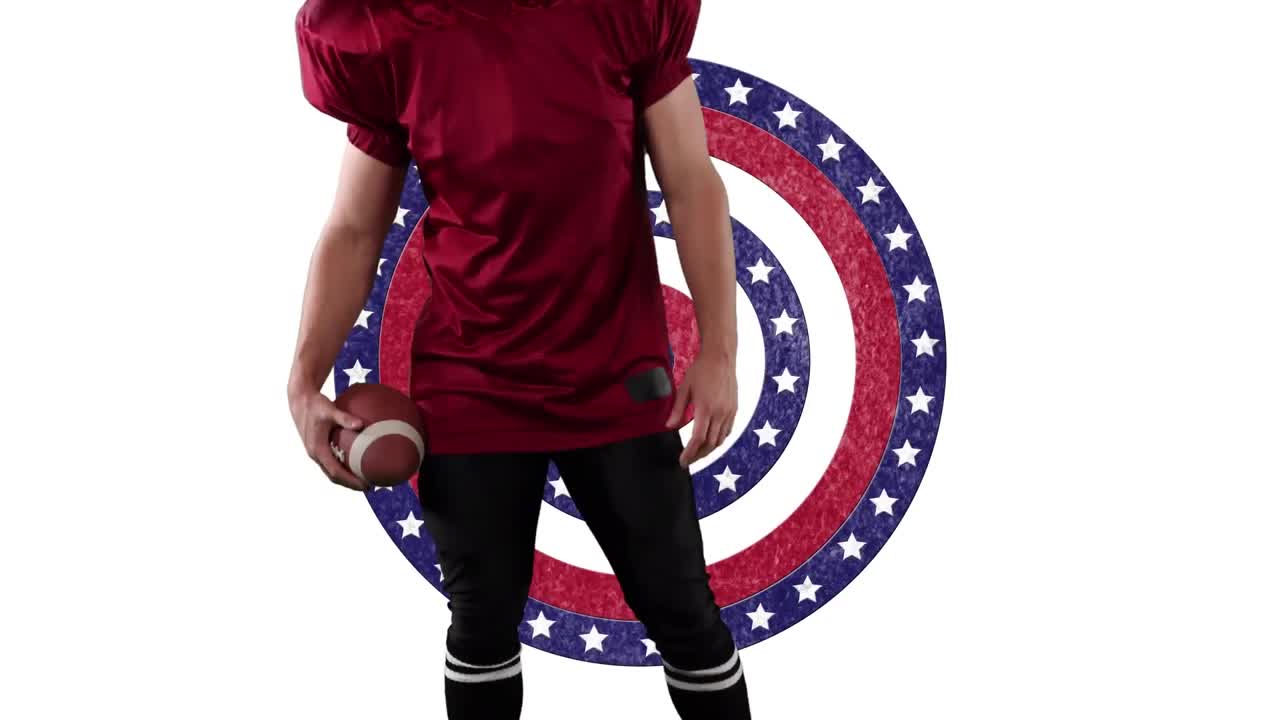 남자 럭비 선수 의 중간 섹션 은 회전 하는 원 에 있는 별 들 을 상대로 공 을 들고 있다