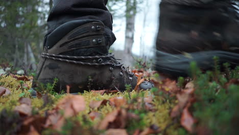 hiking boots in autumn forest