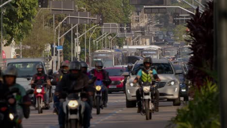 in maze of congested crowded streets, motorbikes dance to their beats