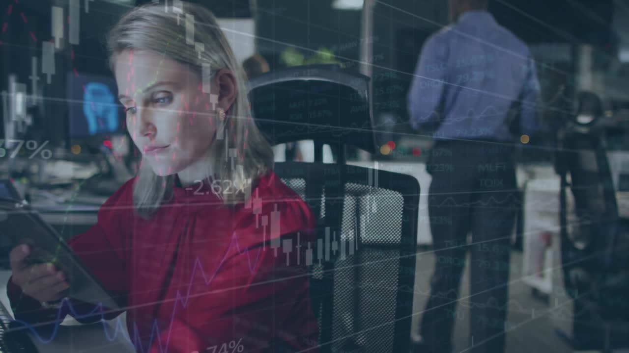 Animation of data processing over businesswoman using tablet in office