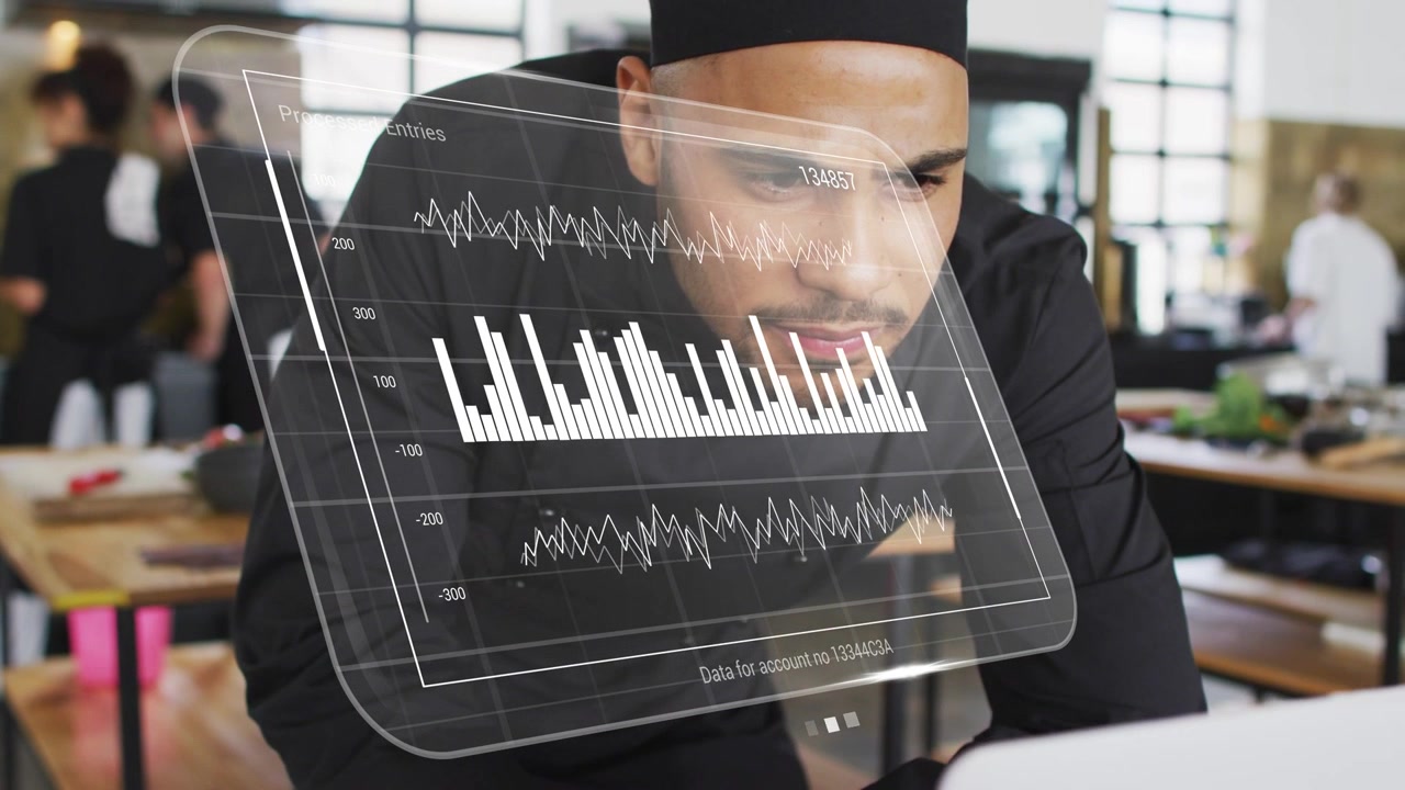 Chef leaning, holo overlay appearing over laptop, scanning graphs analyzing kitchen sales