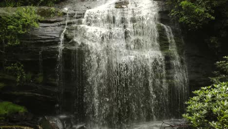 Flying-over-rocks-and-waterfall.