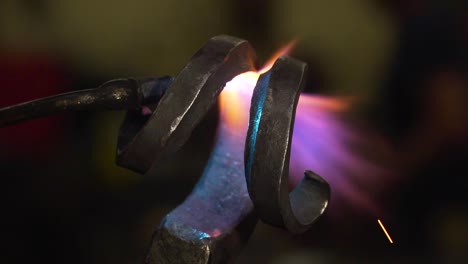 blacksmith metal forging in 120fps slow motion