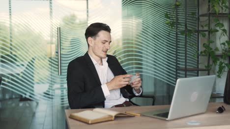 businessman using phone in office