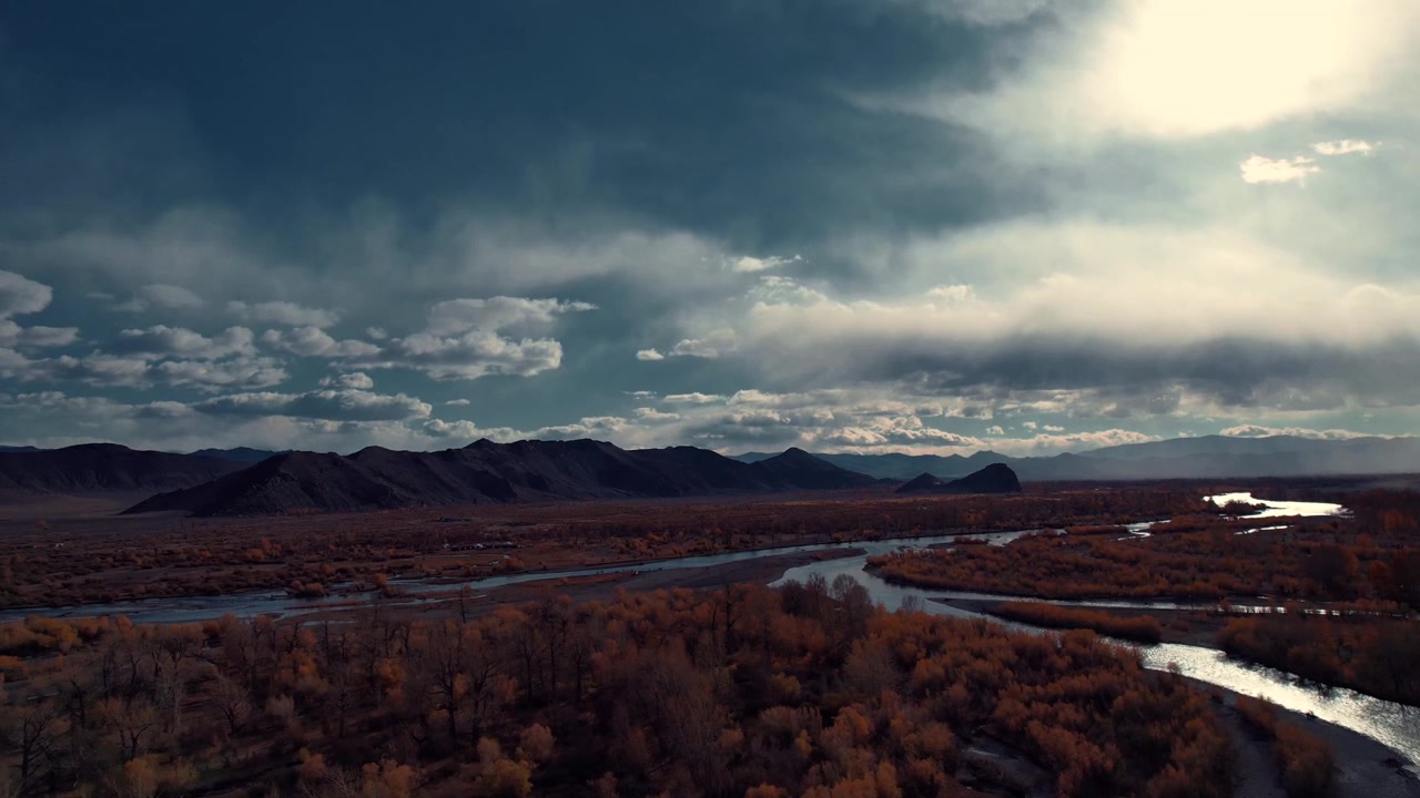 Aerial Drone View of Winding River Through Altai Mountains in Mongolia