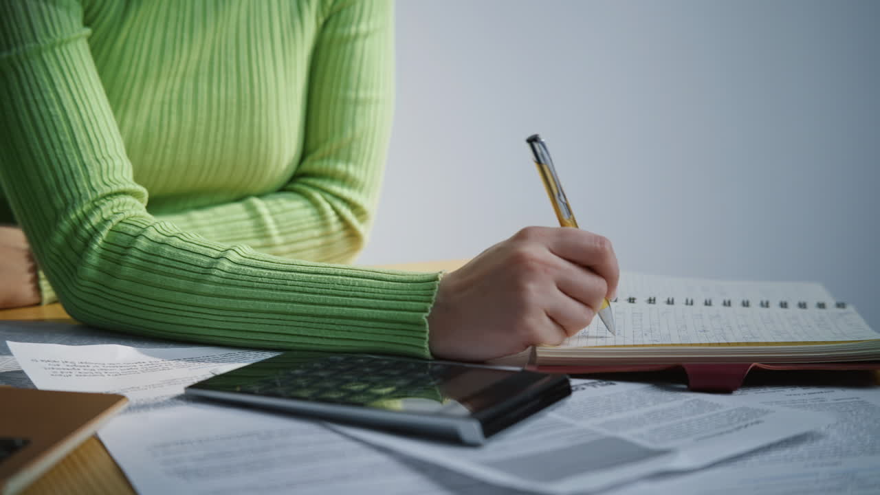 Closeup woman touching computer touchpad typing calculator in office cabinet