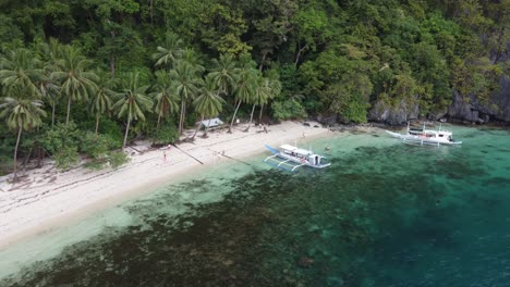 Aerial-dolly,-Pasandigan-Cove-on-Cadlao-Island,-El-Nido