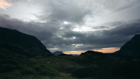 timelapse - dark clouds rolling in on a mountain landscape in austria