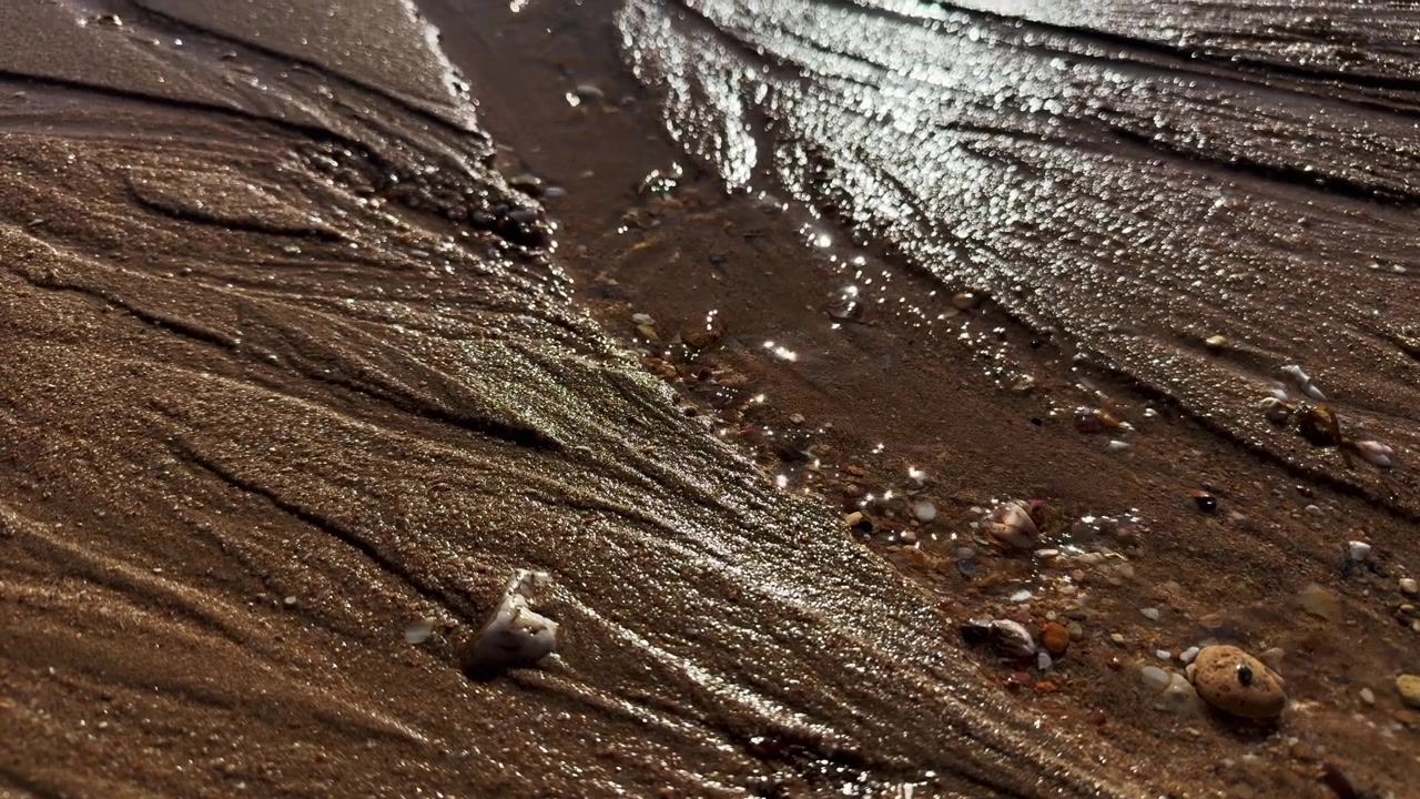 Sabbia e acqua di mare sulla spiaggia di Vau