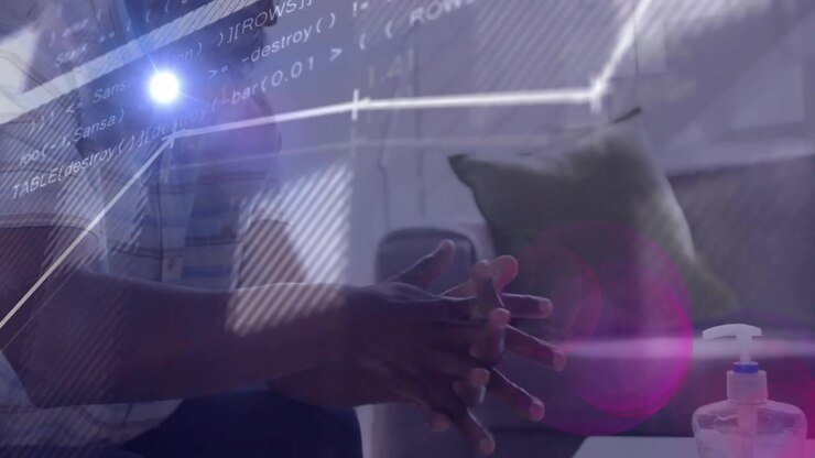 Senior man rubbing hands after applying sanitizer, driving health data overlays syncing with motion