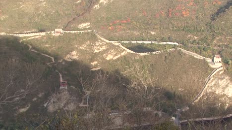 great wall of china, juyong pass section, train passing in the background