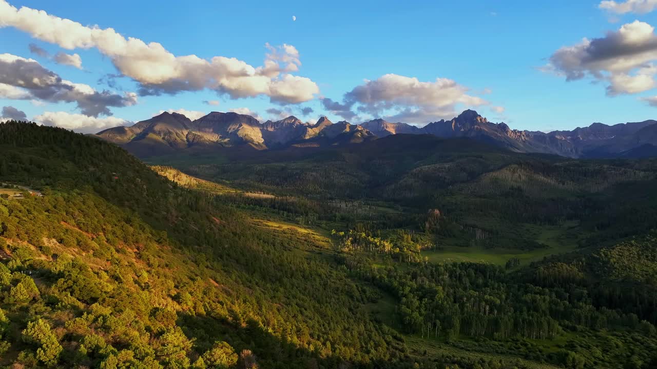 Ridgway Colorado summer Mount Sneffels Wilderness aerial drone sunset golden hour moon Aspen Tree forest grove ranch farmland Montrose Telluride Dallas Divide San Juan Rocky Mountains backwards pan up