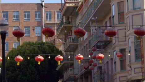 lanterns, buildings, and birds in chinatown, san francisco