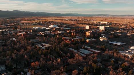 establishing drone shot of montana state university at sunrise