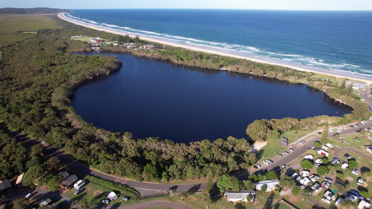Aerial View Of Lake Ainsworth, Tea-stained Freshwater Coastal Dune Lake In NSW, Australia.