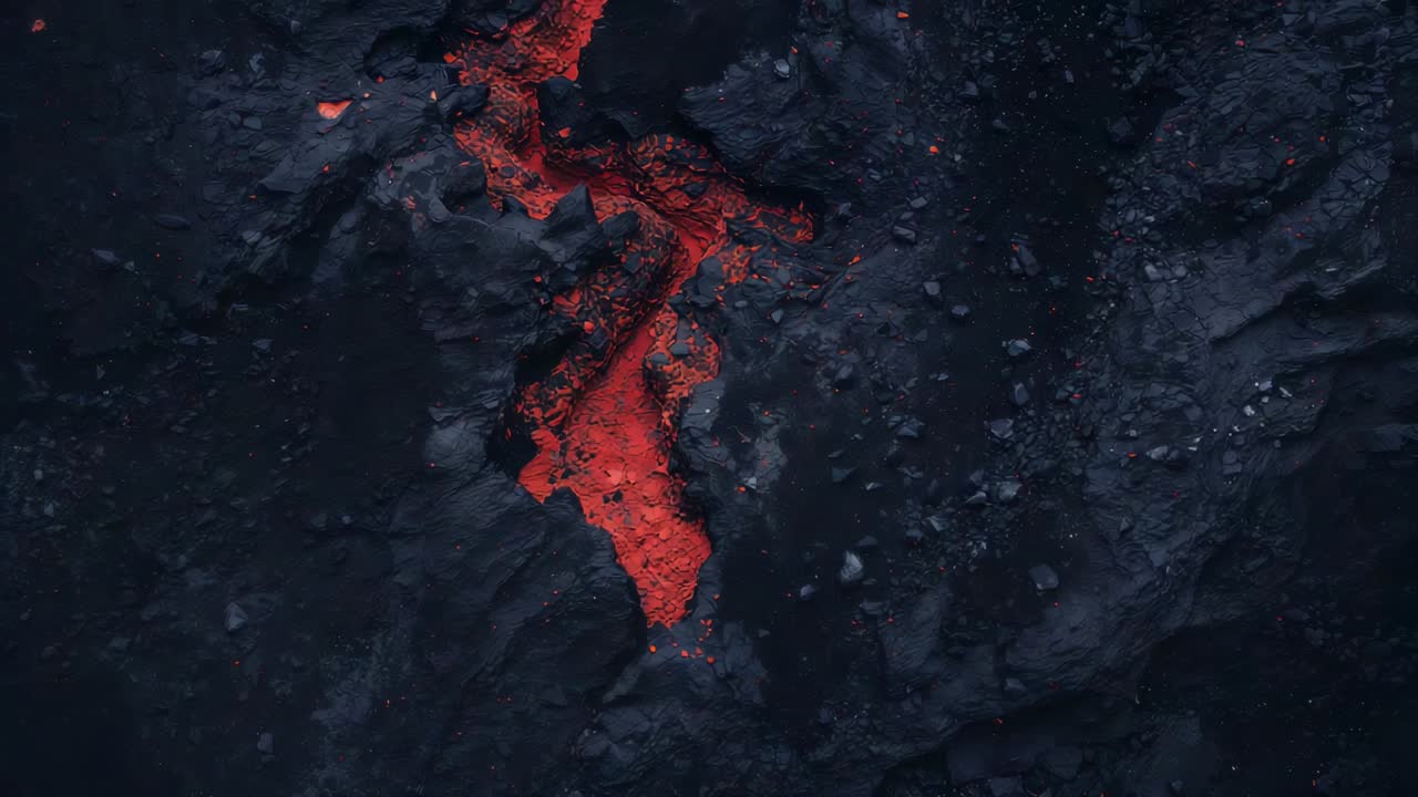 マグマの圧力で玄武岩の地殻が広がり、溶けた溶岩の通路が広がり、残り火と瓦礫が露出している