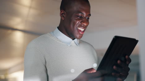 night, office and business black man on tablet