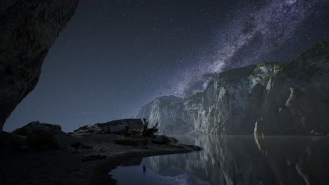 hyperlapse of night starry sky with mountain and ocean beach in lofoten norway