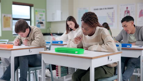 students taking a test in a classroom
