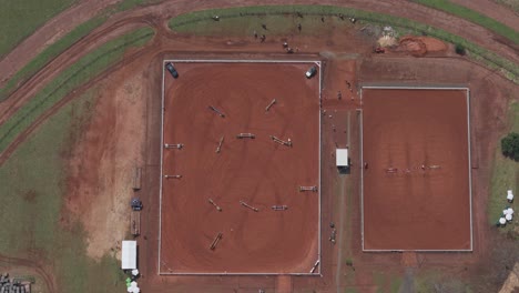 Aerial-View-of-Thrilling-Horse-Jumping-Event-from-the-top