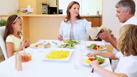 family having dinner together