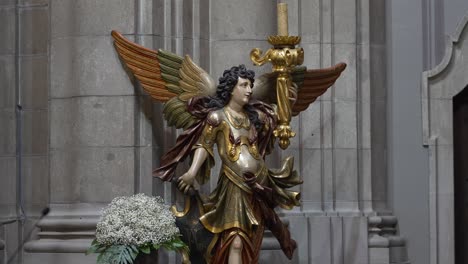 Golden-angel-statue-with-wings,-Sanctuary-of-Sameiro