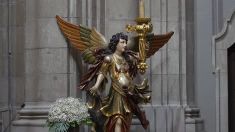 golden angel statue with wings, sanctuary of sameiro