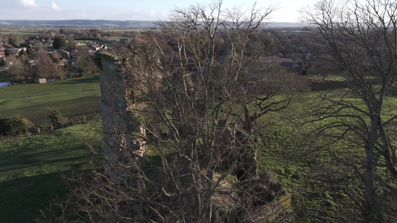 Aerial footage of Ayton castle in North Yorkshire, aerial orbit of an old English castle