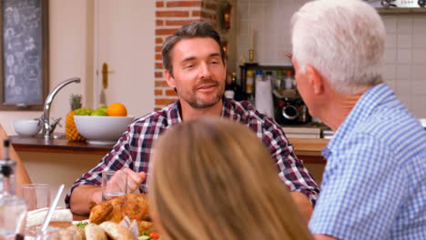 cute family talking around the table