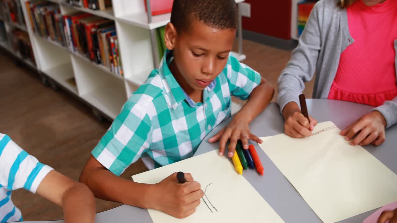 Kids drawing in library