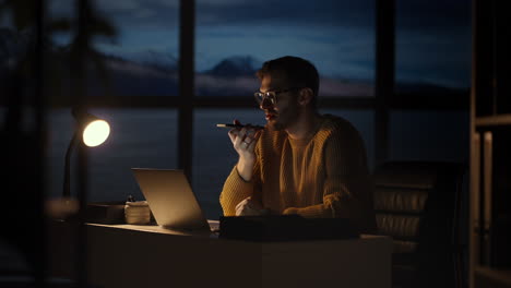 Portrait-of-Thoughtful-Successful-Businessman-Working-on-Laptop-Computer-in-His-Big-City-Office.-Digital-Entrepreneur-does-Data-Analysis-for-e-Commerce-Strategy.